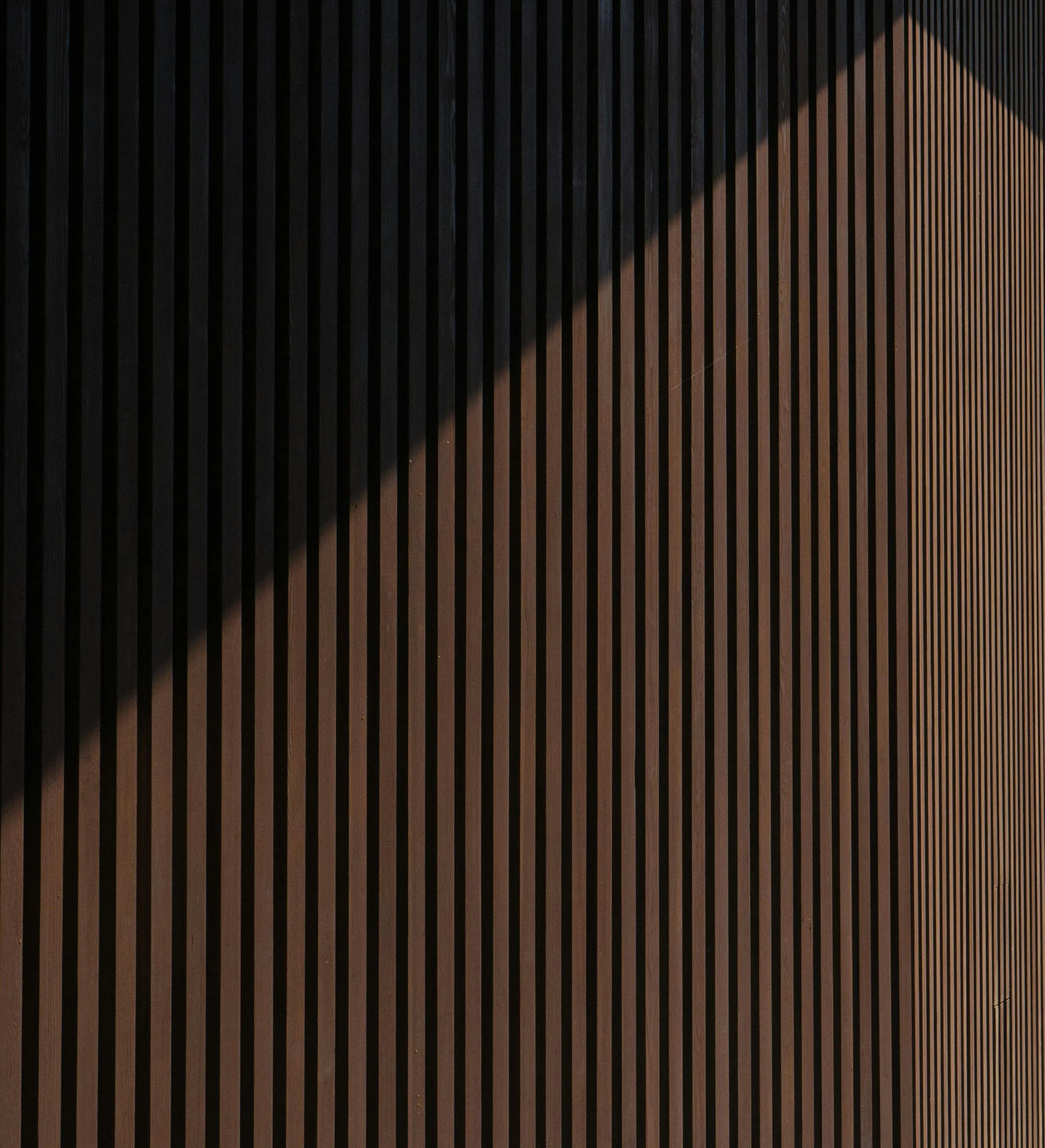 What is typical spacing between slat wall slats?